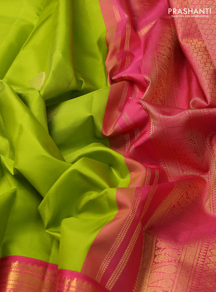 Pure kanchipuram silk saree light green and peach pink with zari woven buttas and long zari woven korvai border