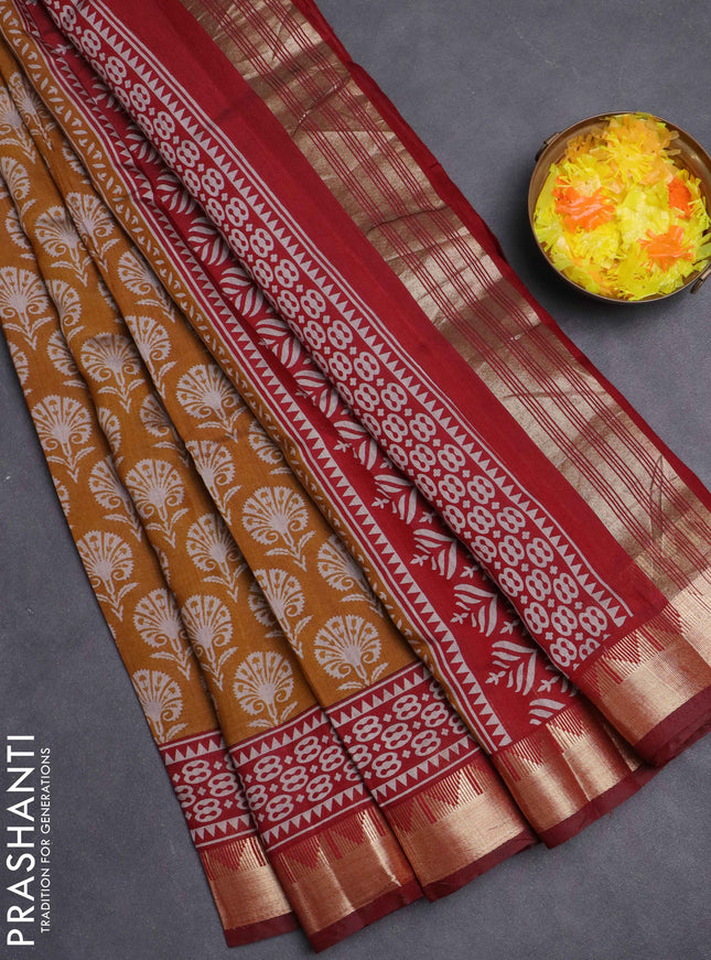 Maheshwari cotton saree dark mustard and maroon with allover flower prints and zari woven border