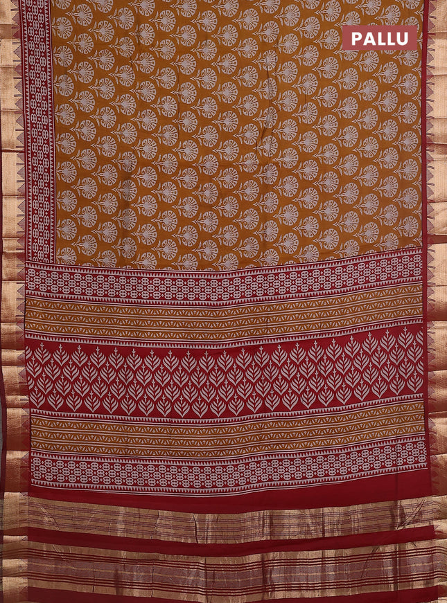 Maheshwari cotton saree dark mustard and maroon with allover flower prints and zari woven border