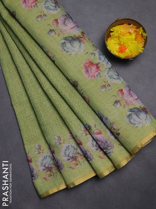 Linen cotton saree light green with allover prints and printed border