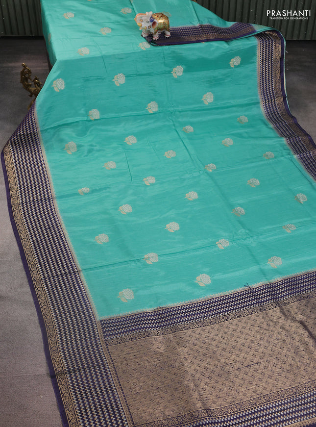 Semi raw silk saree teal blue and navy blue with silver & gold flower zari woven buttas and zari woven border