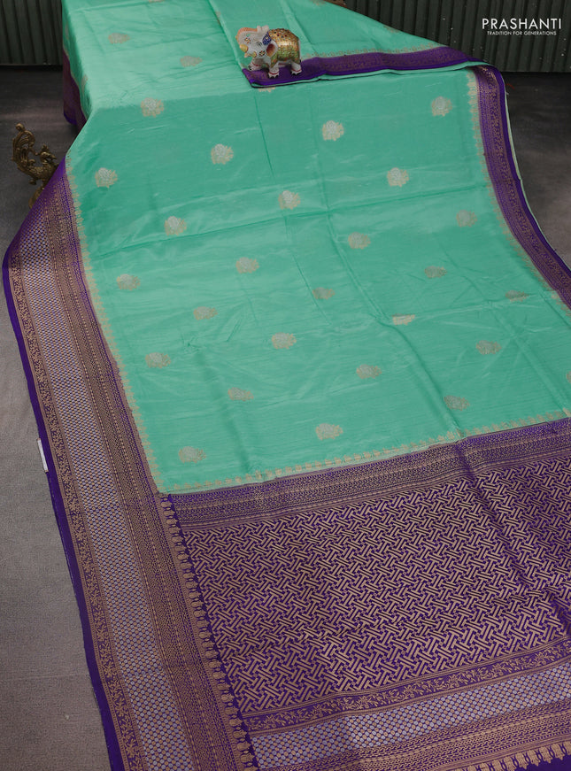 Semi raw silk saree teal green and violet with silver & gold flower zari woven buttas and zari woven border
