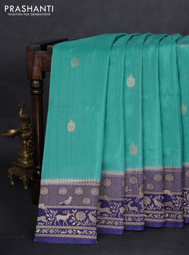 Semi raw silk saree teal blue and navy blue with zari woven buttas and zari woven border