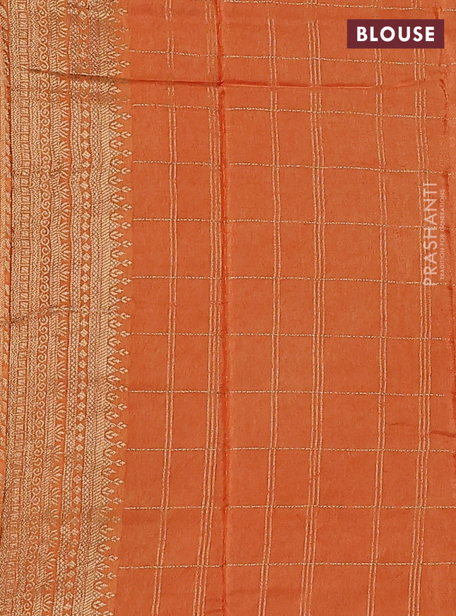 Semi raw silk saree orange and pale orange with allover zari woven checked pattern and zari woven border