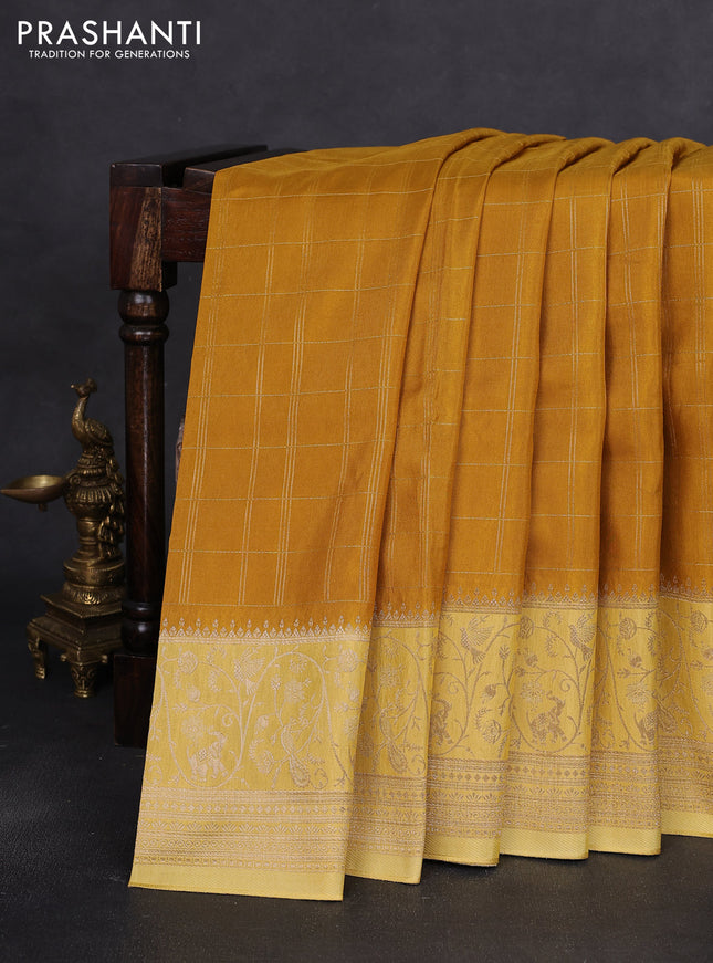 Semi raw silk saree mustard yellow and yellow with allover zari woven checked pattern and zari woven border