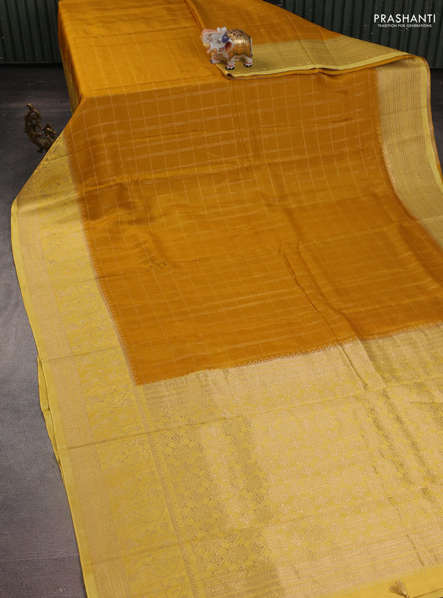 Semi raw silk saree mustard yellow and yellow with allover zari woven checked pattern and zari woven border