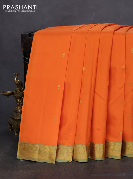 Pure kanchipuram silk saree orange and dual shade of pista green with zari woven buttas and rich zari woven border