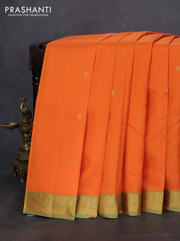 Pure kanchipuram silk saree orange and dual shade of pista green with zari woven buttas and rich zari woven border