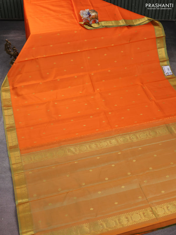 Pure kanchipuram silk saree orange and dual shade of pista green with zari woven buttas and rich zari woven border