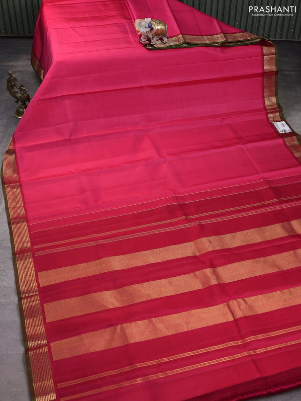 Pure kanchipuram silk saree pink and dual shade of green with plain body and rich zari woven border