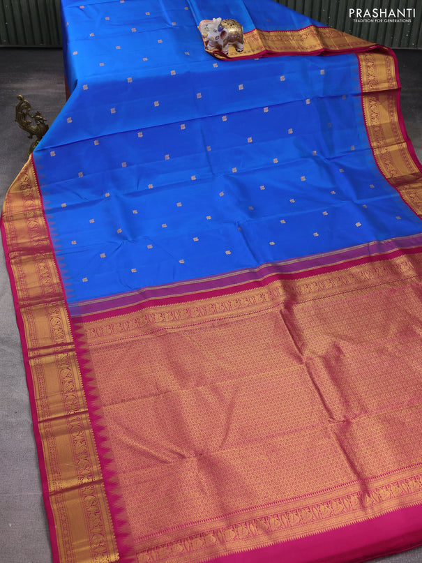 Pure kanchipuram silk saree blue and pink with annam zari woven buttas and temple design zari woven border