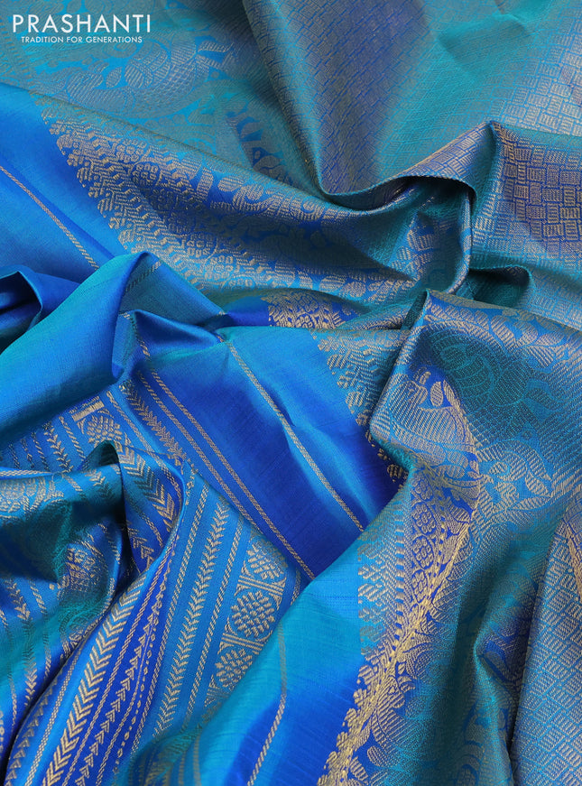 Pure kanchipuram silk saree dual shade of bluish teal green with allover zari weaves in borderless style