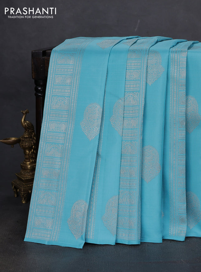 Pure kanchipuram silk saree teal blue and mustard yellow with allover silver zari weaves & buttas in borderless style