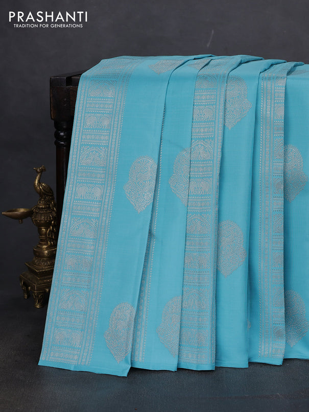 Pure kanchipuram silk saree teal blue and mustard yellow with allover silver zari weaves & buttas in borderless style