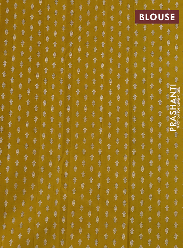 Pure kanchipuram silk saree teal blue and mustard yellow with allover silver zari weaves & buttas in borderless style