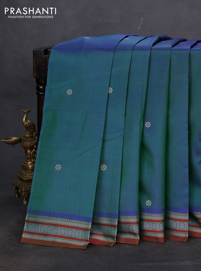 Pure kanchipuram silk saree dual shade of bluish green and dual shade of maroon with thread woven buttas and thread woven border