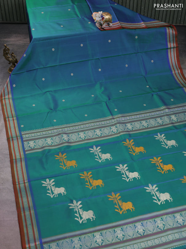 Pure kanchipuram silk saree dual shade of bluish green and dual shade of maroon with thread woven buttas and thread woven border