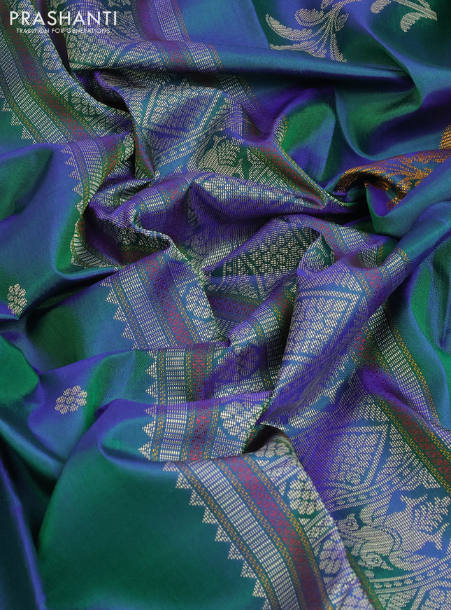 Pure kanchipuram silk saree dual shade of bluish green and dual shade of maroon with thread woven buttas and thread woven border