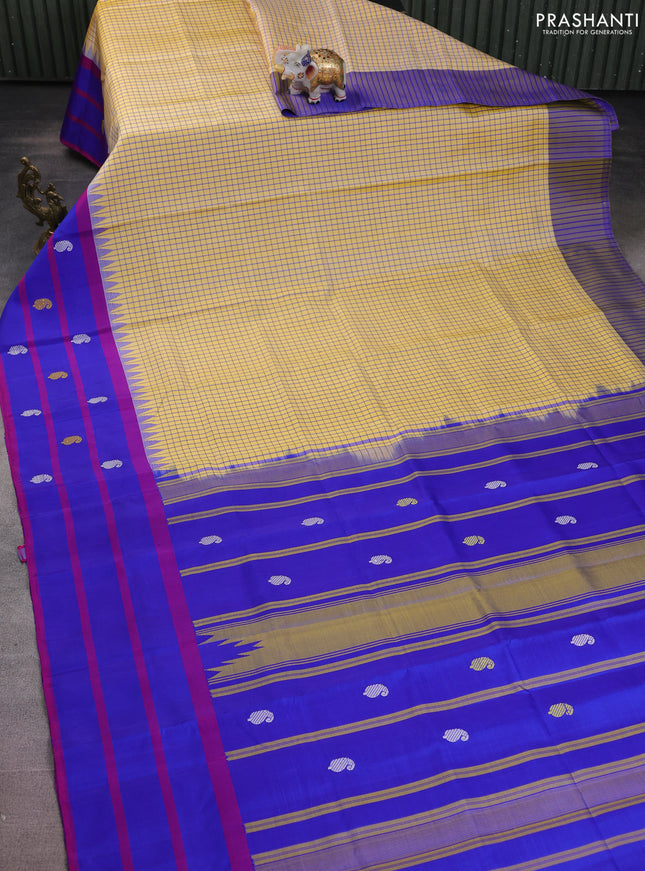 Pure kanchipuram silk saree pale yellow and blue with allover small checked pattern and temple design thread woven butta border