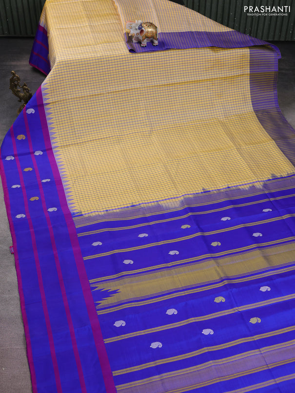 Pure kanchipuram silk saree pale yellow and blue with allover small checked pattern and temple design thread woven butta border