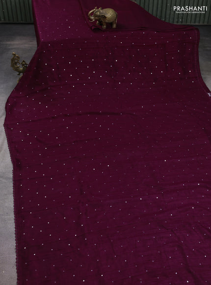 Semi raw silk saree wine shade with allover mirror work and lace work border