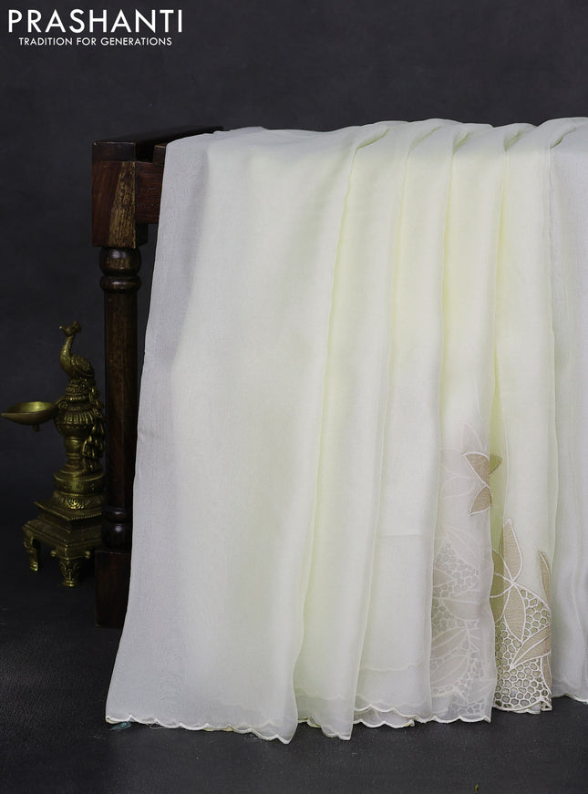 Satin Organza saree off white with plain body and floral design cut work border