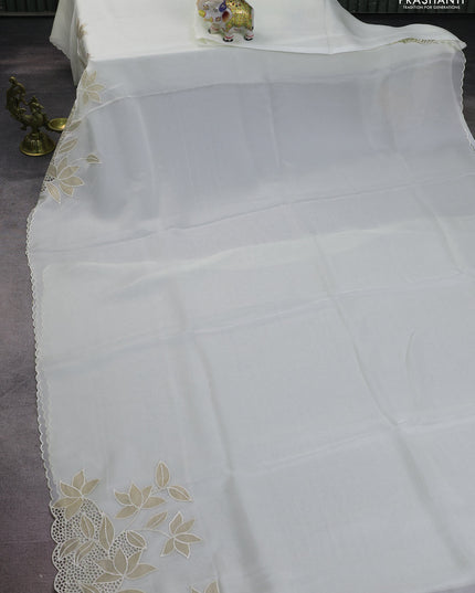 Satin Organza saree off white with plain body and floral design cut work border