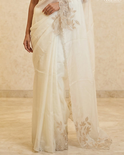 Satin Organza saree off white with plain body and floral design cut work border