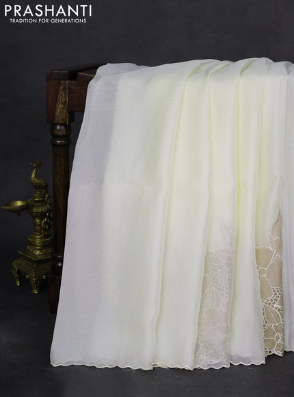 Satin Organza saree off white with plain body and floral design cut work border