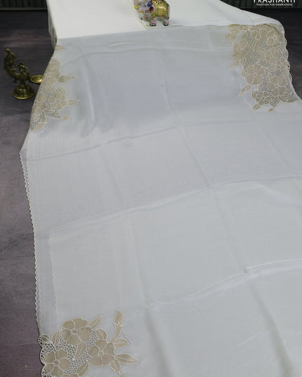 Satin Organza saree off white with plain body and floral design cut work border