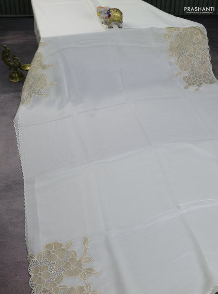 Satin Organza saree off white with plain body and floral design cut work border