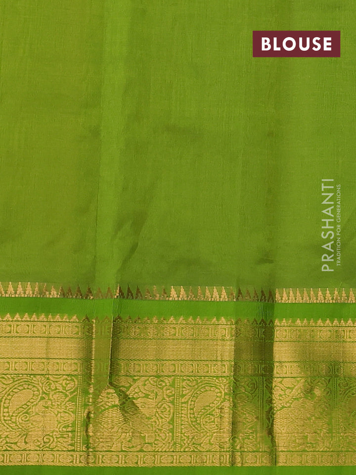 Kuppadam silk cotton saree yellow and green with allover lakshadeepam weaves and temple design zari woven border