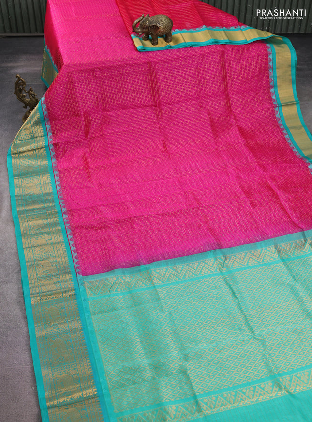 Kuppadam silk cotton saree pink and teal green with allover lakshadeepam weaves and temple design zari woven border