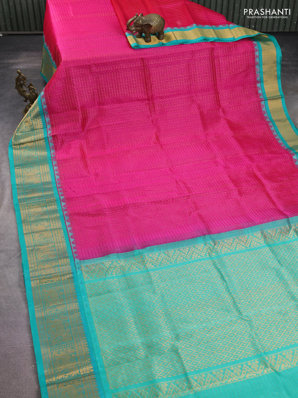 Kuppadam silk cotton saree pink and teal green with allover lakshadeepam weaves and temple design zari woven border