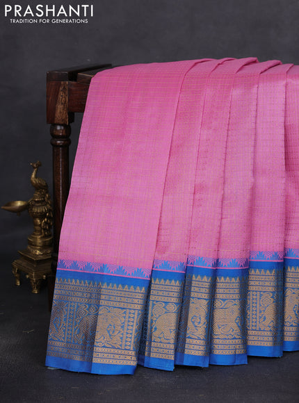 Kuppadam silk cotton saree light pink and cs blue with allover lakshadeepam weaves and temple design zari woven border