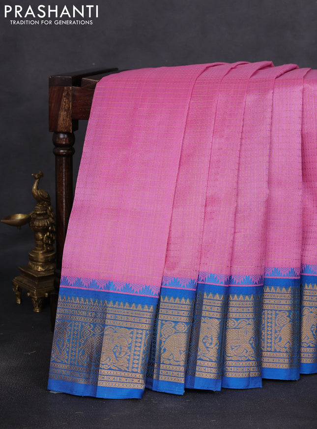 Kuppadam silk cotton saree light pink and cs blue with allover lakshadeepam weaves and temple design zari woven border