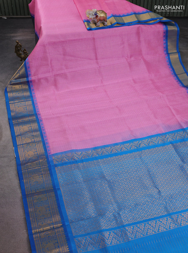 Kuppadam silk cotton saree light pink and cs blue with allover lakshadeepam weaves and temple design zari woven border