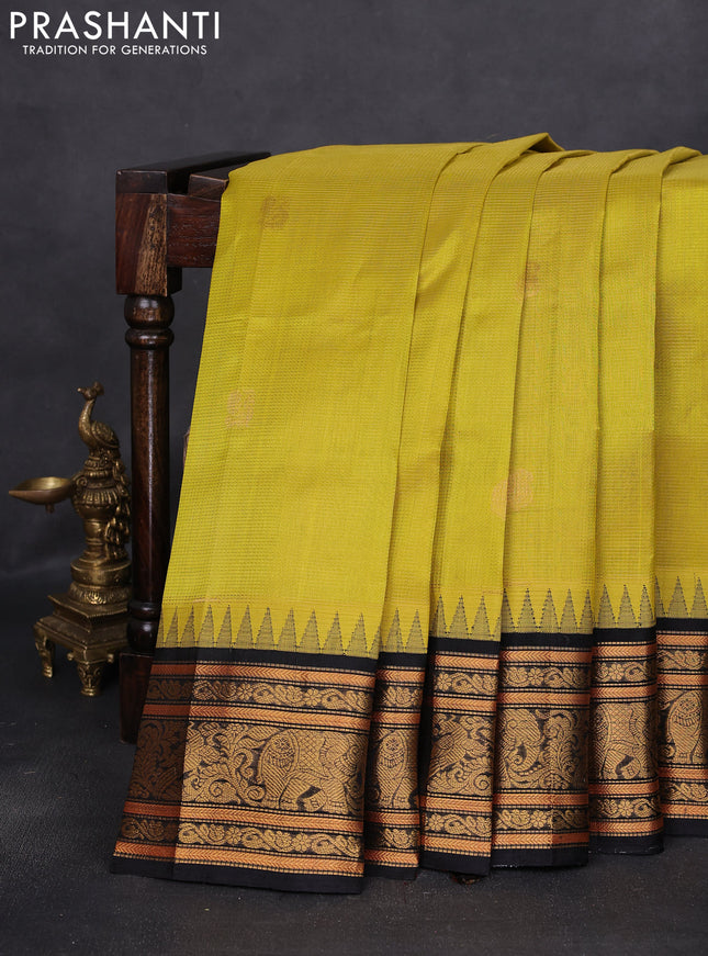 Kuppadam silk cotton saree lime yellow and black with allover vairosi pattern & zari buttas and temple design zari woven border