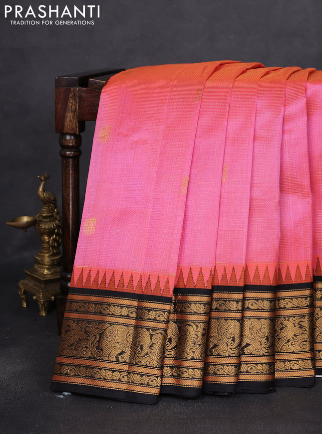 Kuppadam silk cotton saree peach pink and black with allover vairosi pattern & zari buttas and temple design zari woven border