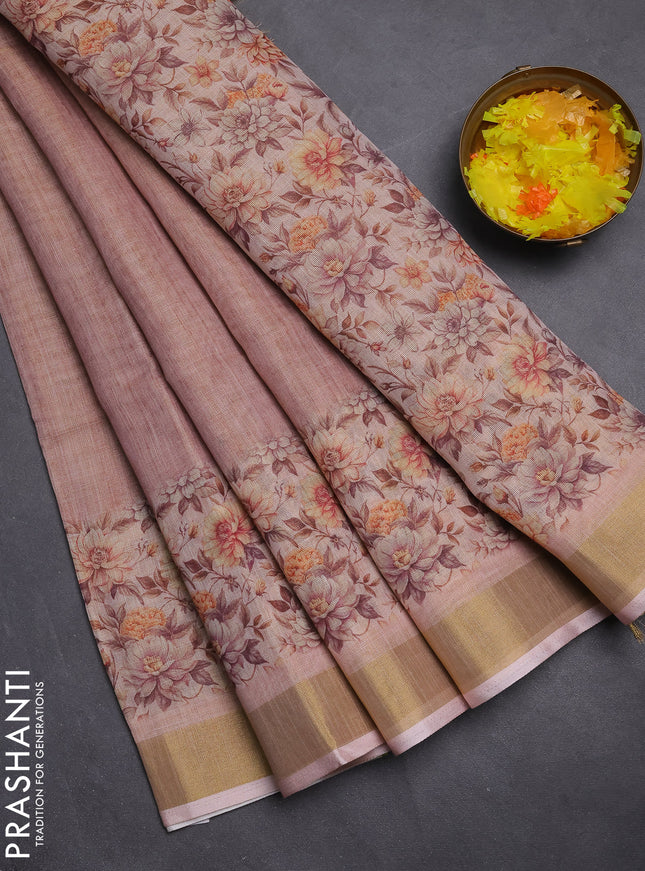 Linen cotton saree peach shade with plain body and floral printed border
