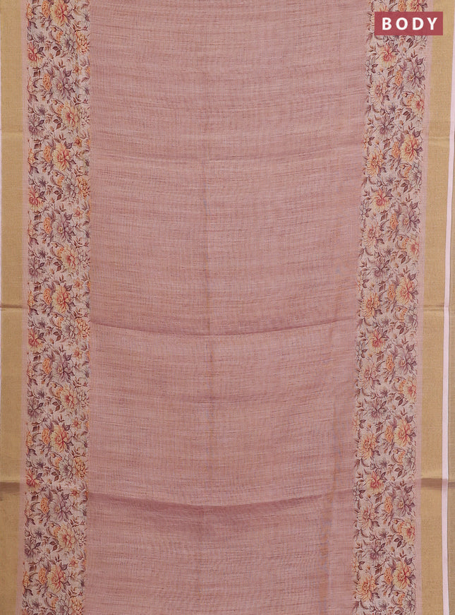 Linen cotton saree peach shade with plain body and floral printed border