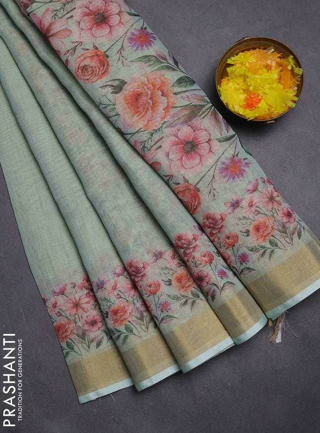 Linen cotton saree pastel green with plain body and floral printed border