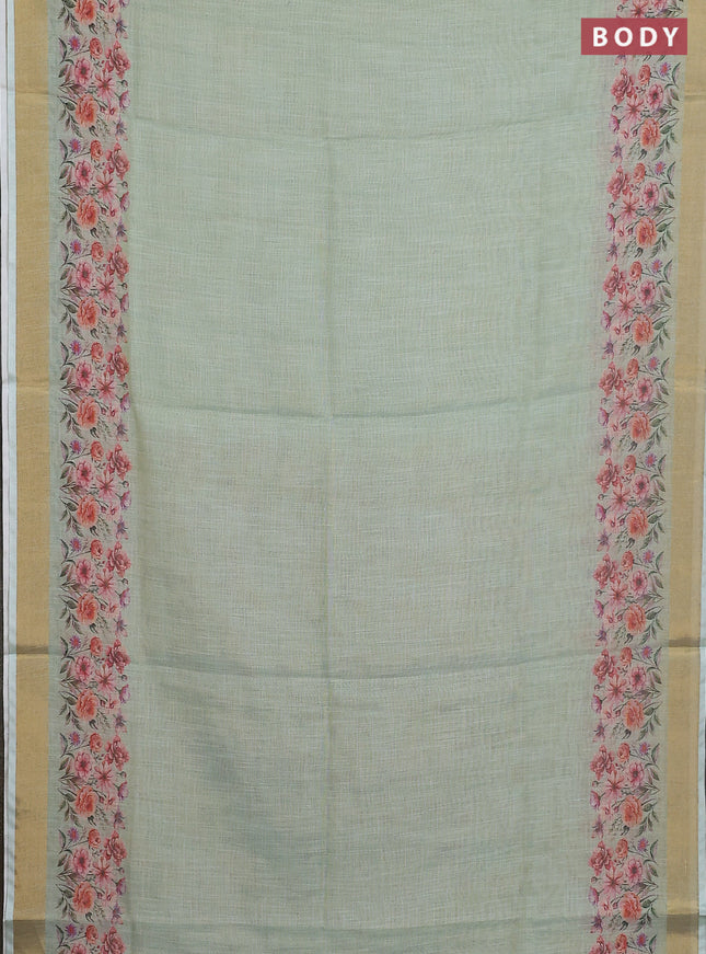 Linen cotton saree pastel green with plain body and floral printed border