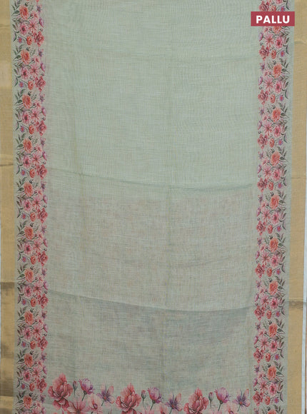 Linen cotton saree pastel green with plain body and floral printed border