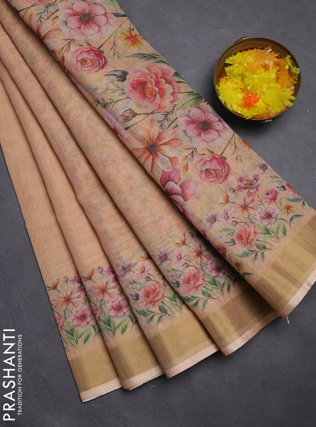 Linen cotton saree pale orange with plain body and floral printed border