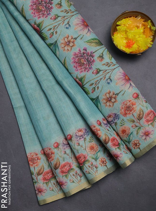 Linen cotton saree teal blue with plain body and digital printed border