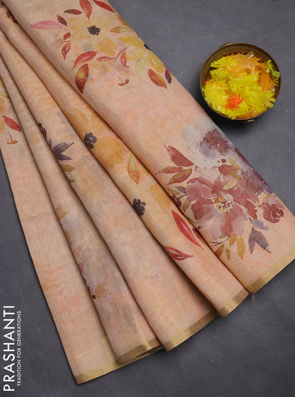 Linen cotton saree pale orange with floral digital prints and zari woven piping border