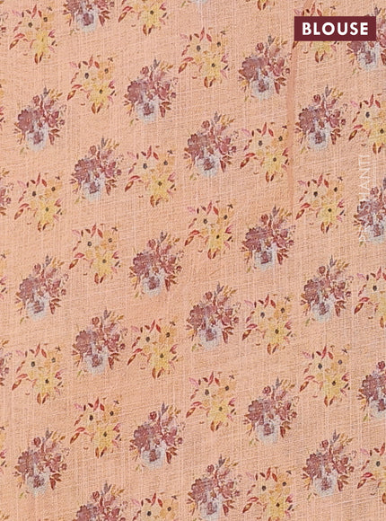 Linen cotton saree pale orange with floral digital prints and zari woven piping border