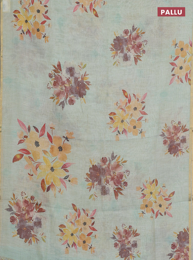 Linen cotton saree pastel green with floral digital prints and zari woven piping border