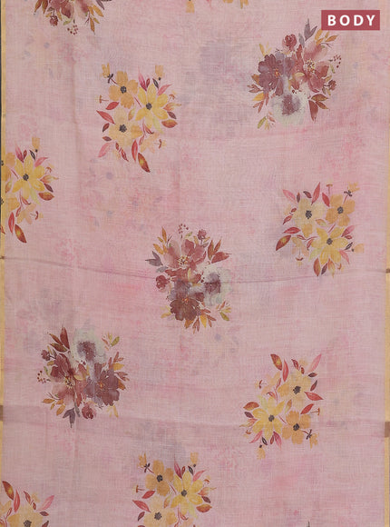 Linen cotton saree pastel pink with floral digital prints and zari woven piping border